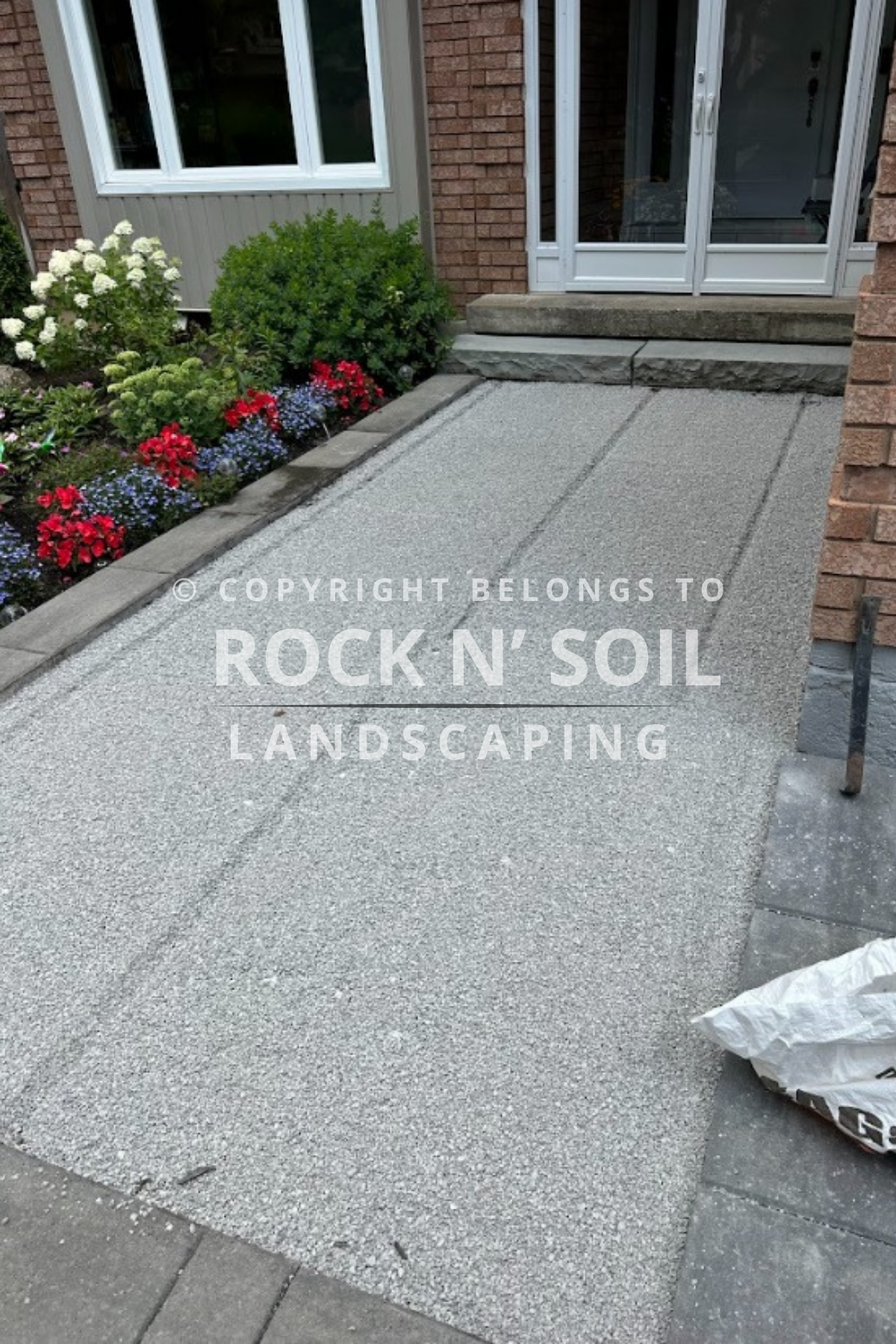 Walkway before interlocking, showing the original state before landscaping work