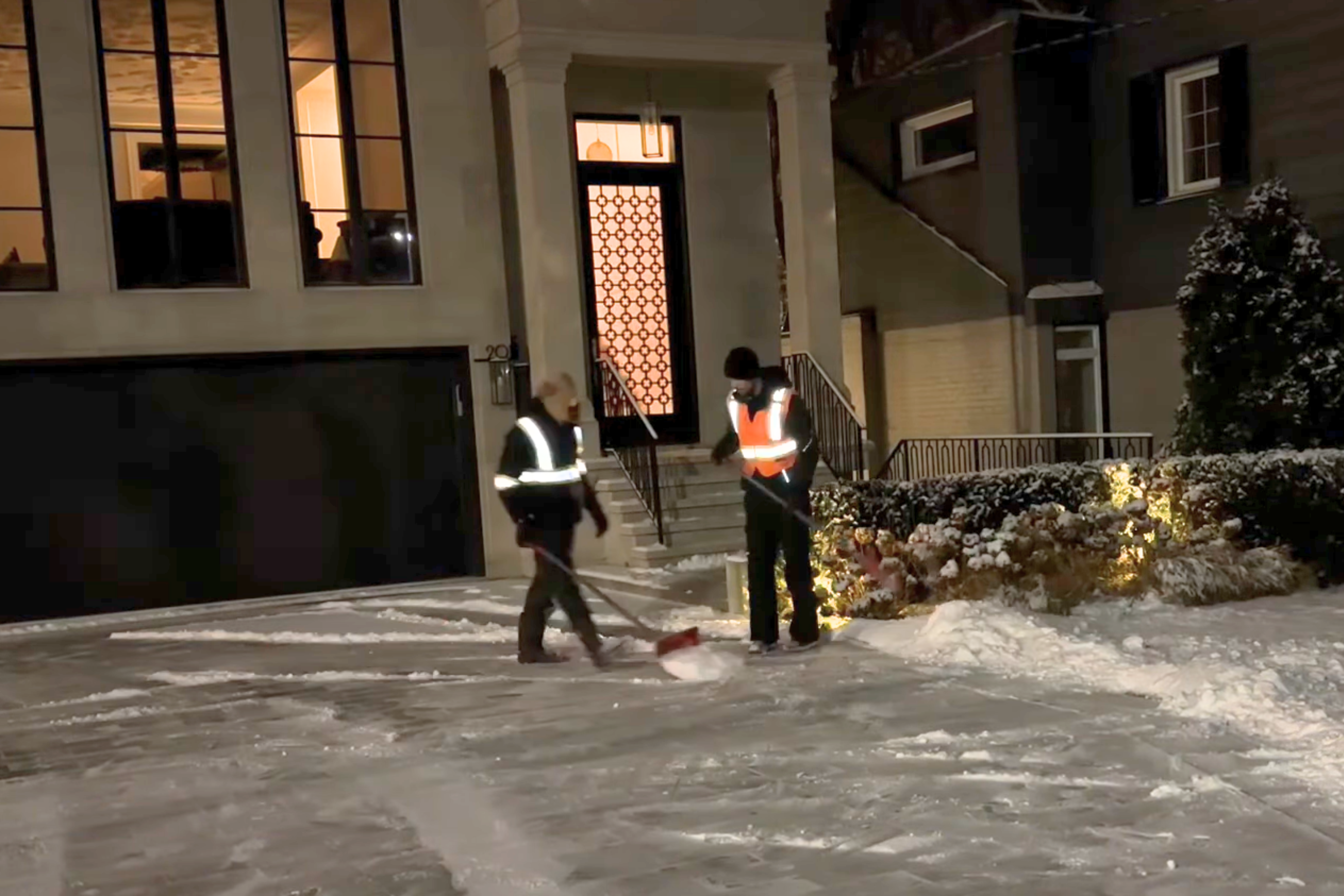 "A time-lapse video showing a dedicated snow removal crew transforming a snow-covered property into a clear and safe space, capturing the hard work and coordination of the team
